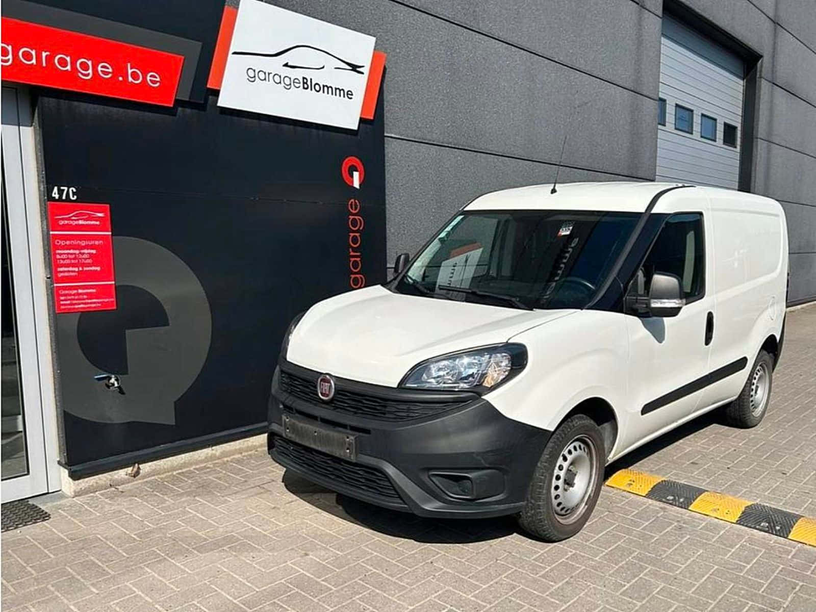 Fiat Doblo At Garage Entrance Wallpaper