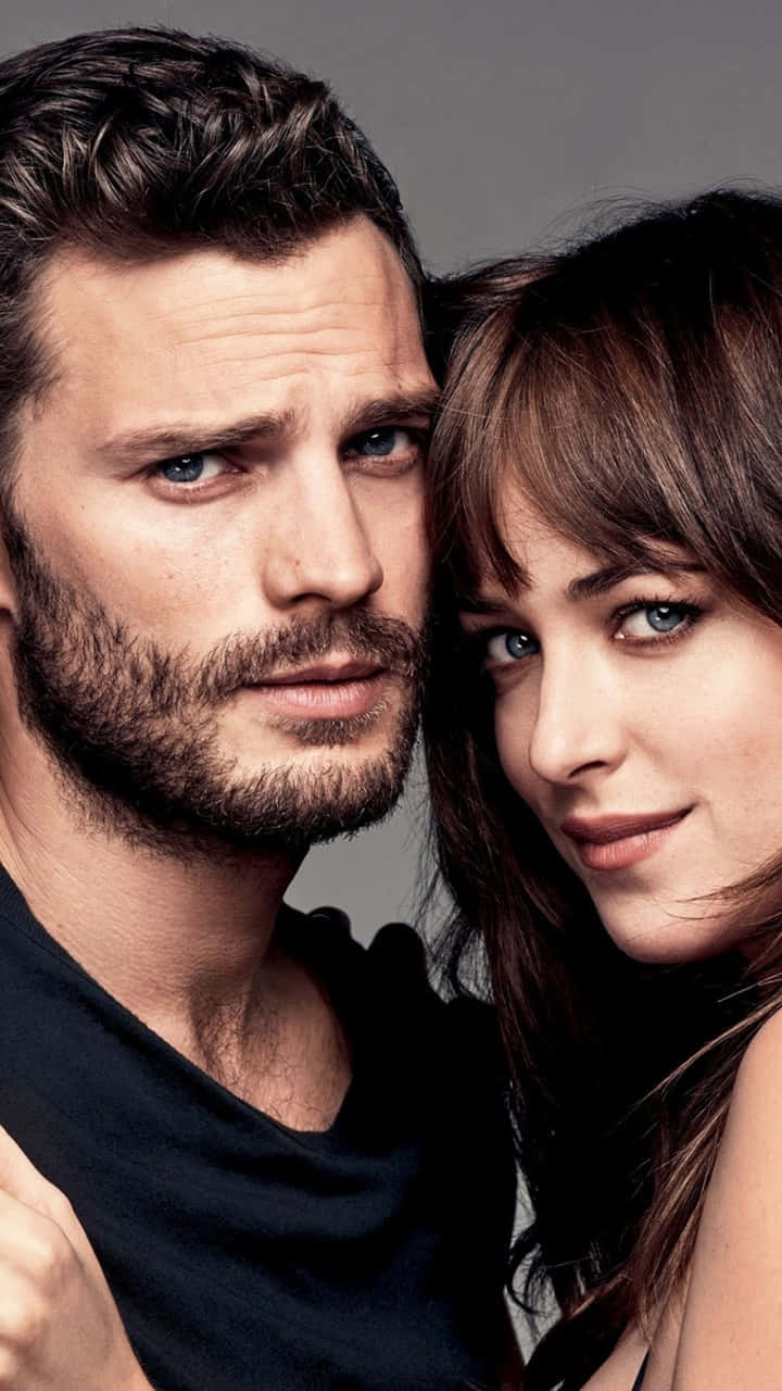 Fifty Shades Of Grey Jamie And Dakota Hugging Wallpaper