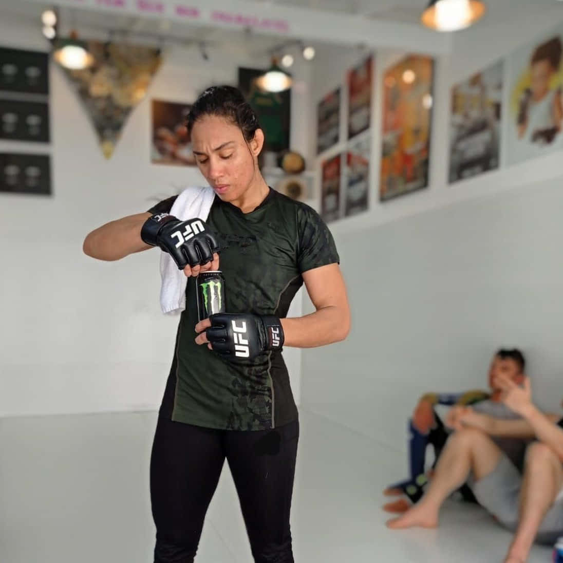 Fighter Taila Santos Opening A Can Of Monster Energy Drink. Wallpaper