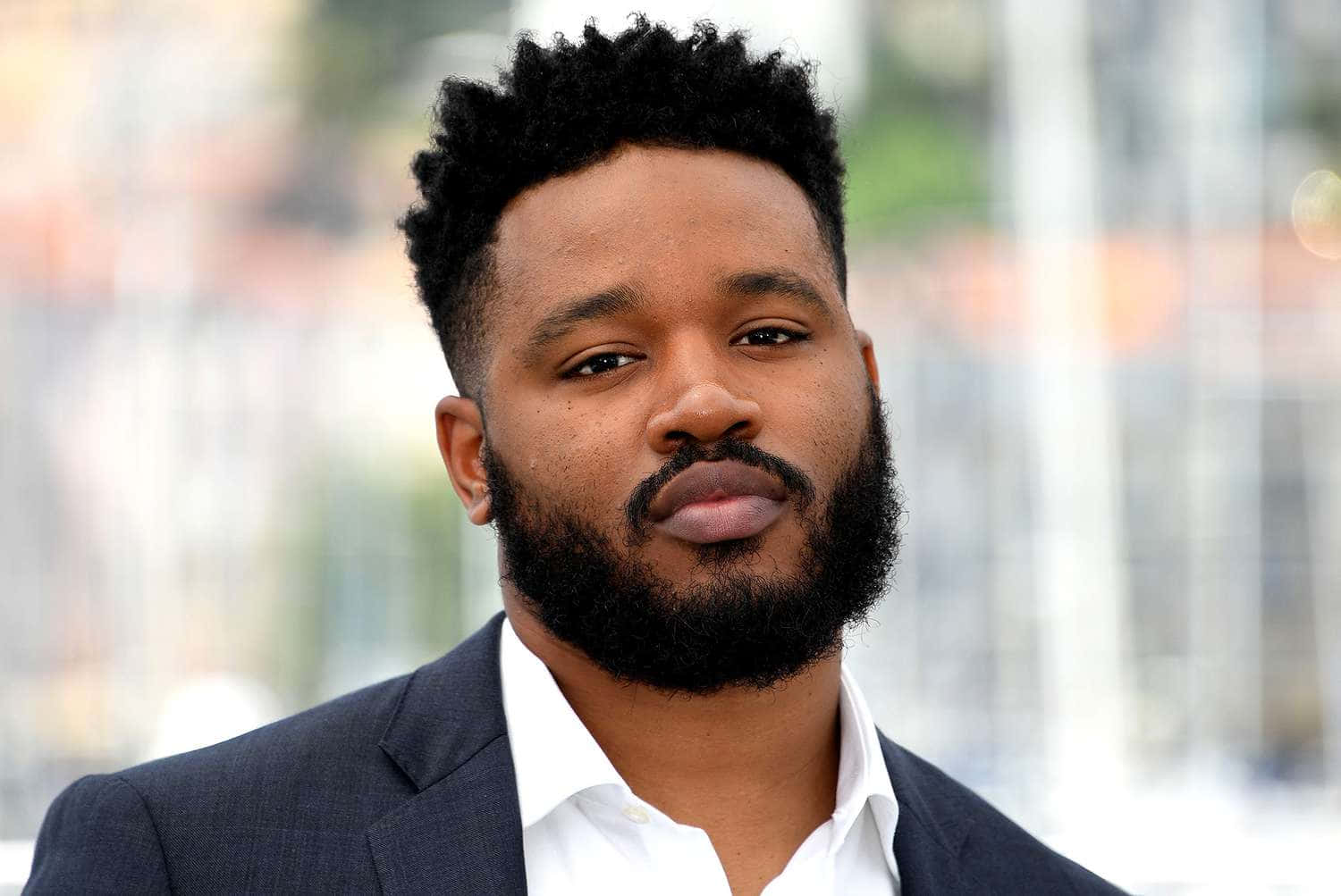 Filmmaker Ryan Coogler Attending A Red Carpet Event Wallpaper