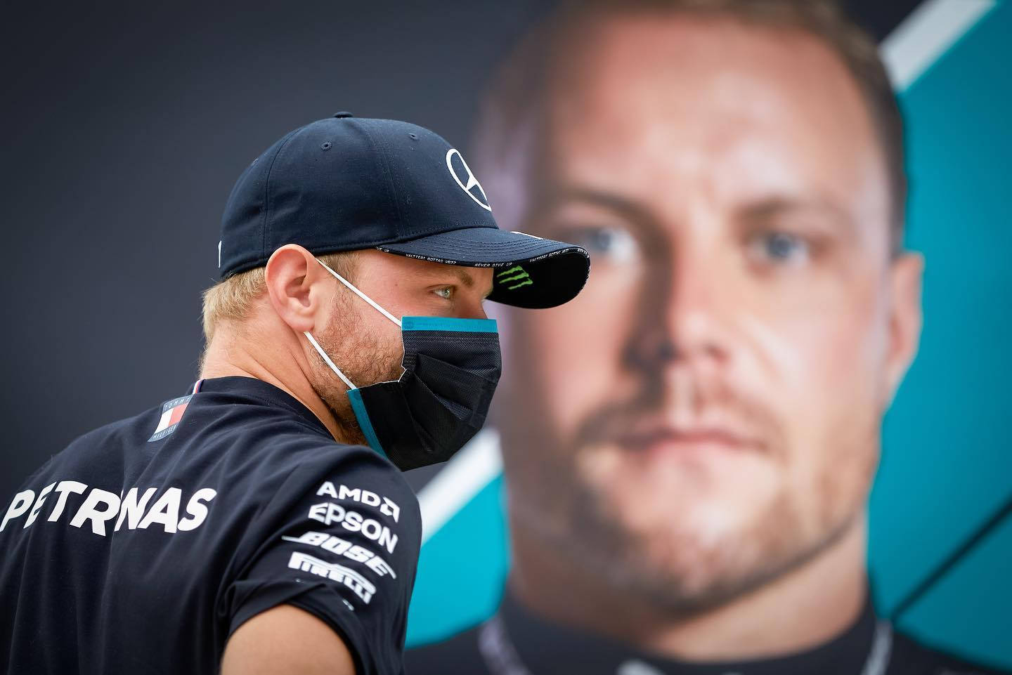 Finnish F1 Racer Valtteri Bottas With Face Mask Wallpaper