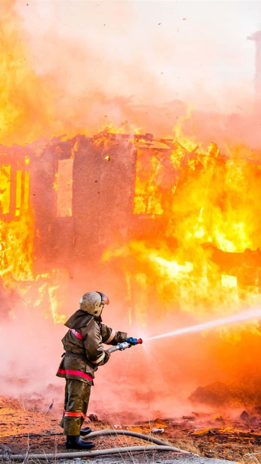 Firefighter Dedicated Phone Helping Protect Local Communities Wallpaper