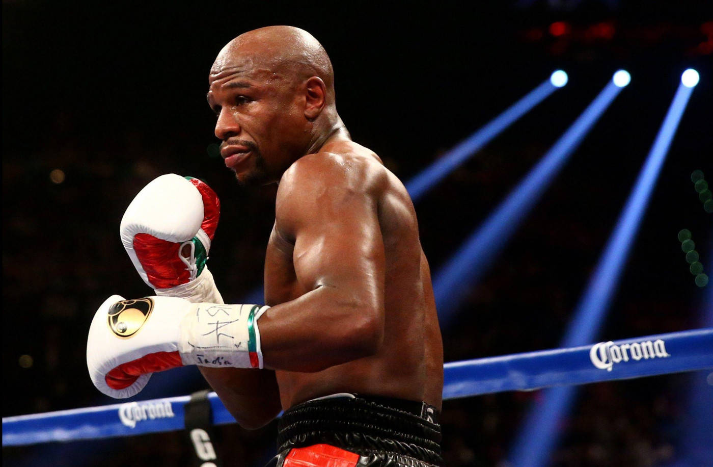 Floyd Mayweather Raising Gloves Light Shines Wallpaper