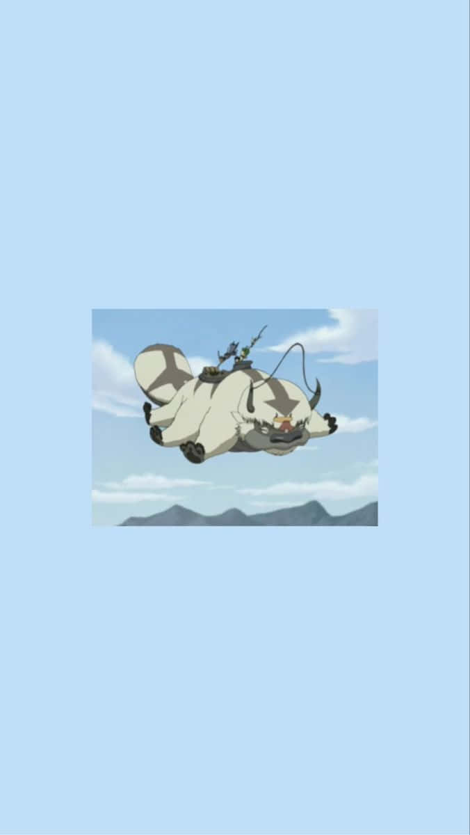 Flying_ Appa_with_ Characters_ Avatar_ Animated_ Show.jpg Wallpaper