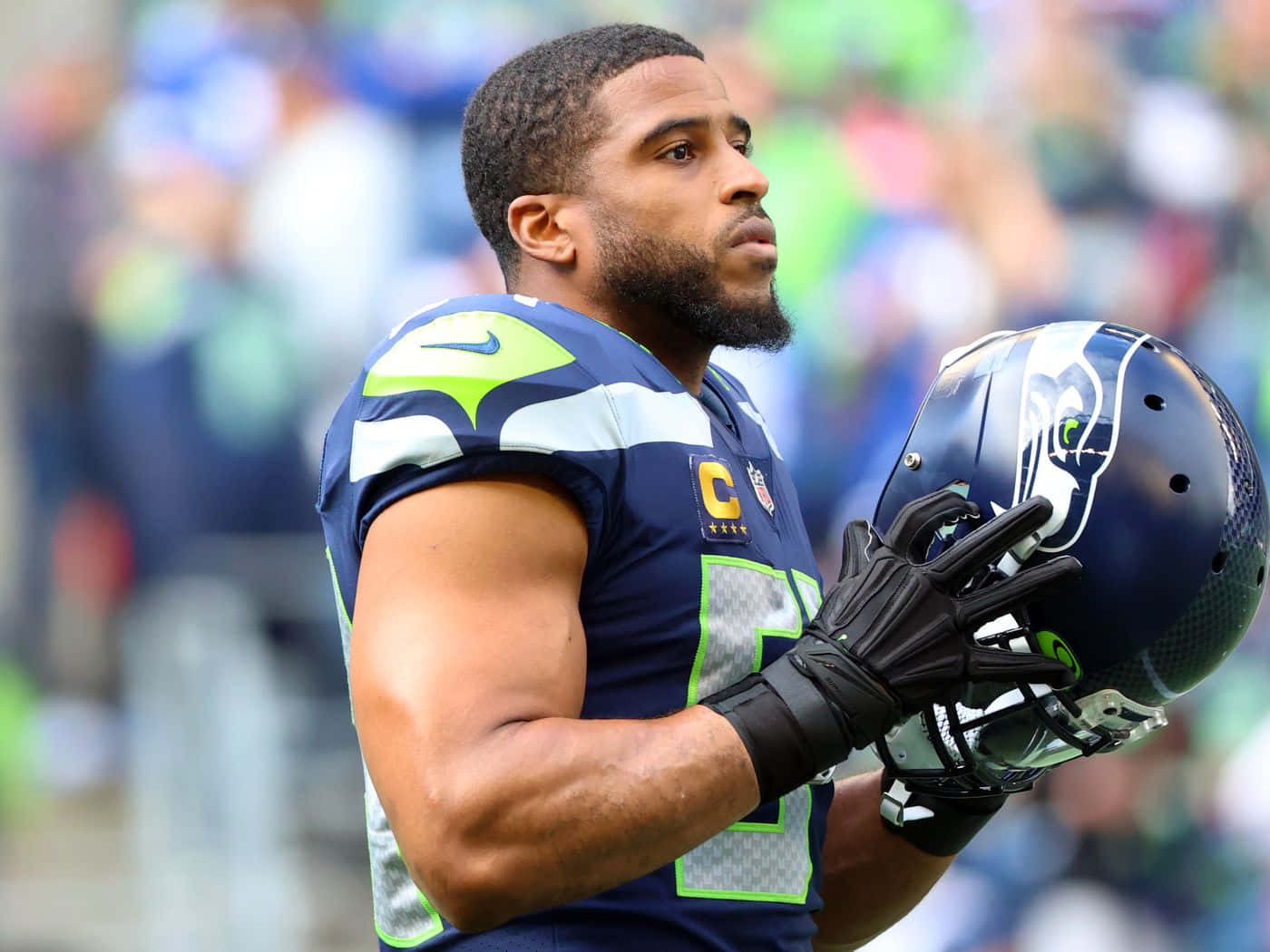 Focused Football Player Bobby Wagner Wallpaper