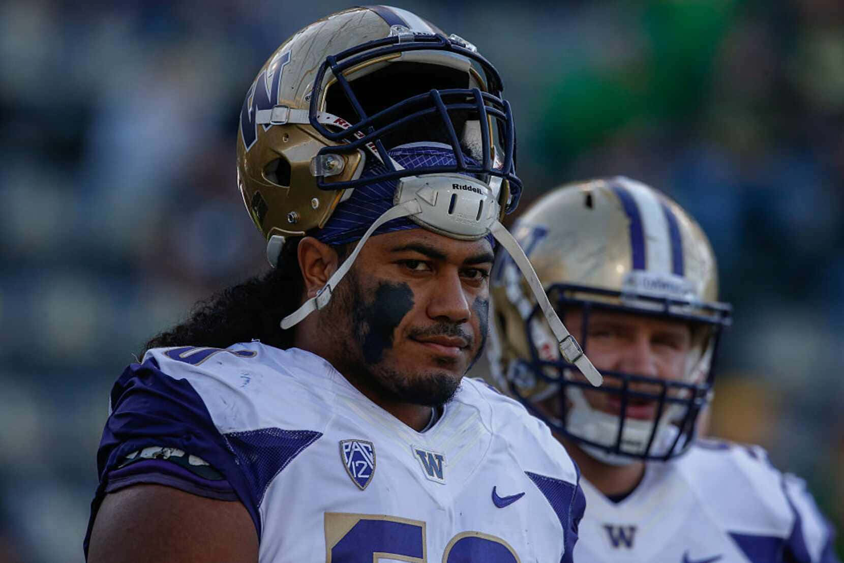 Focused Football Player Vita Vea Wallpaper