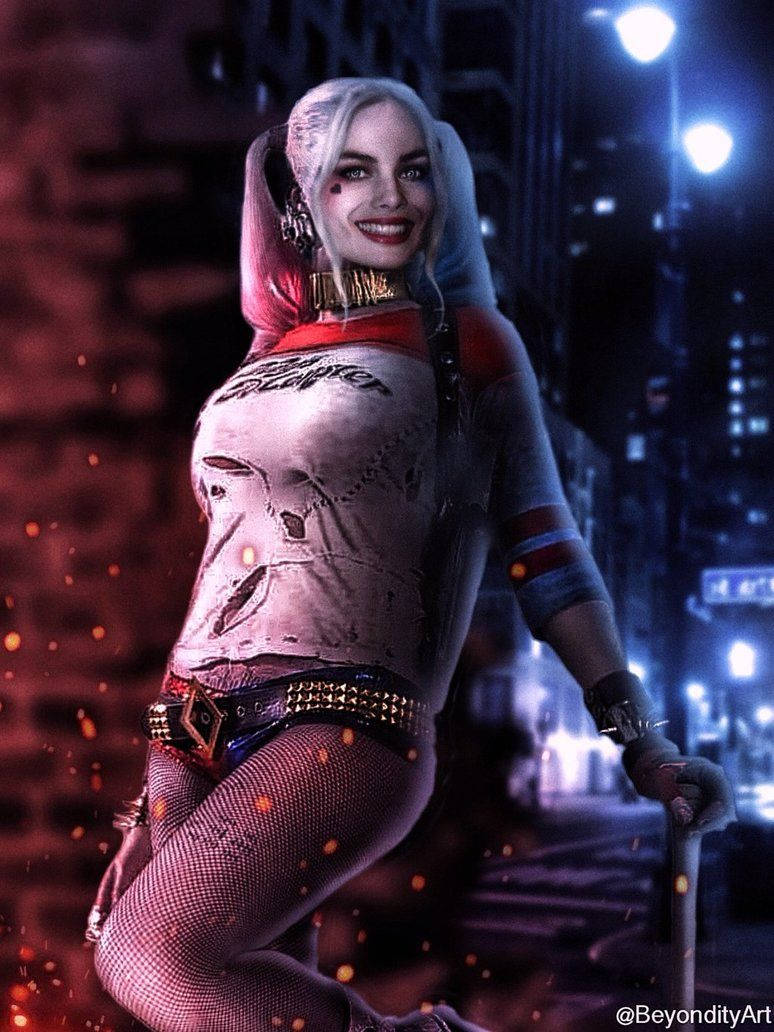 Follow The Joker's Lead With Harley Quinn! Wallpaper