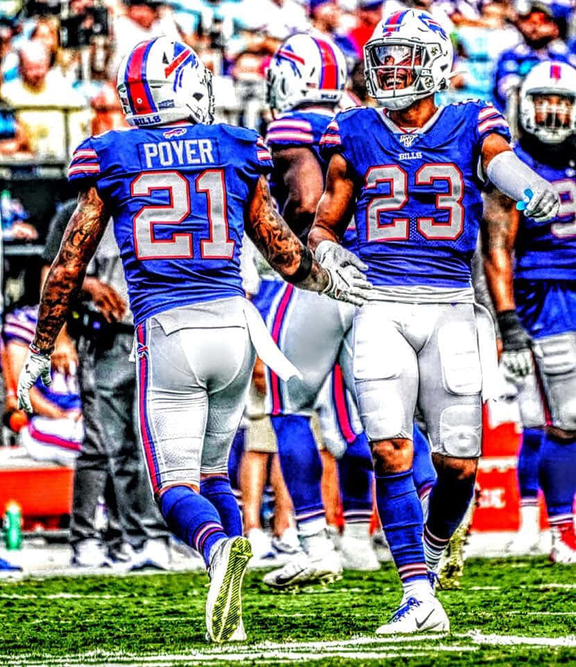 Football Celebration Poyerand Teammate Wallpaper