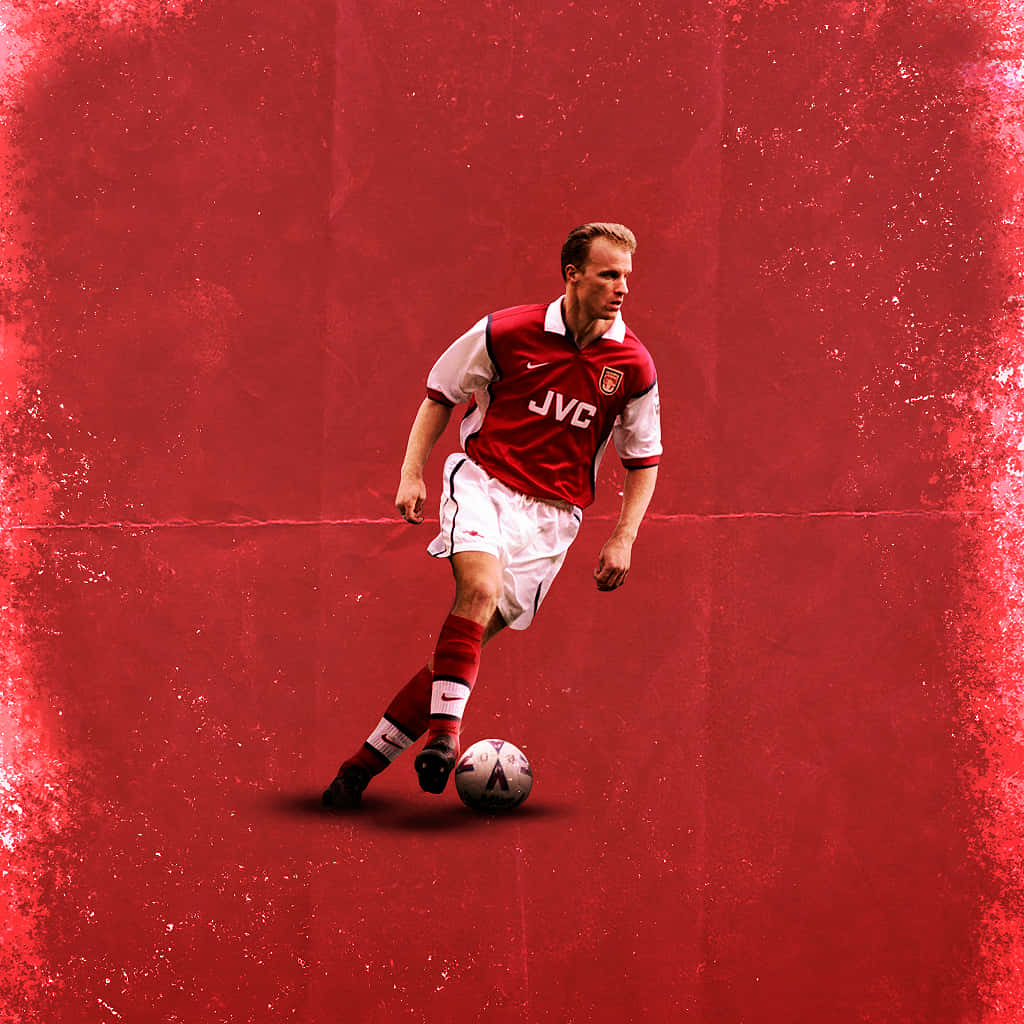 Football Icon Dennis Bergkamp In Action Wallpaper