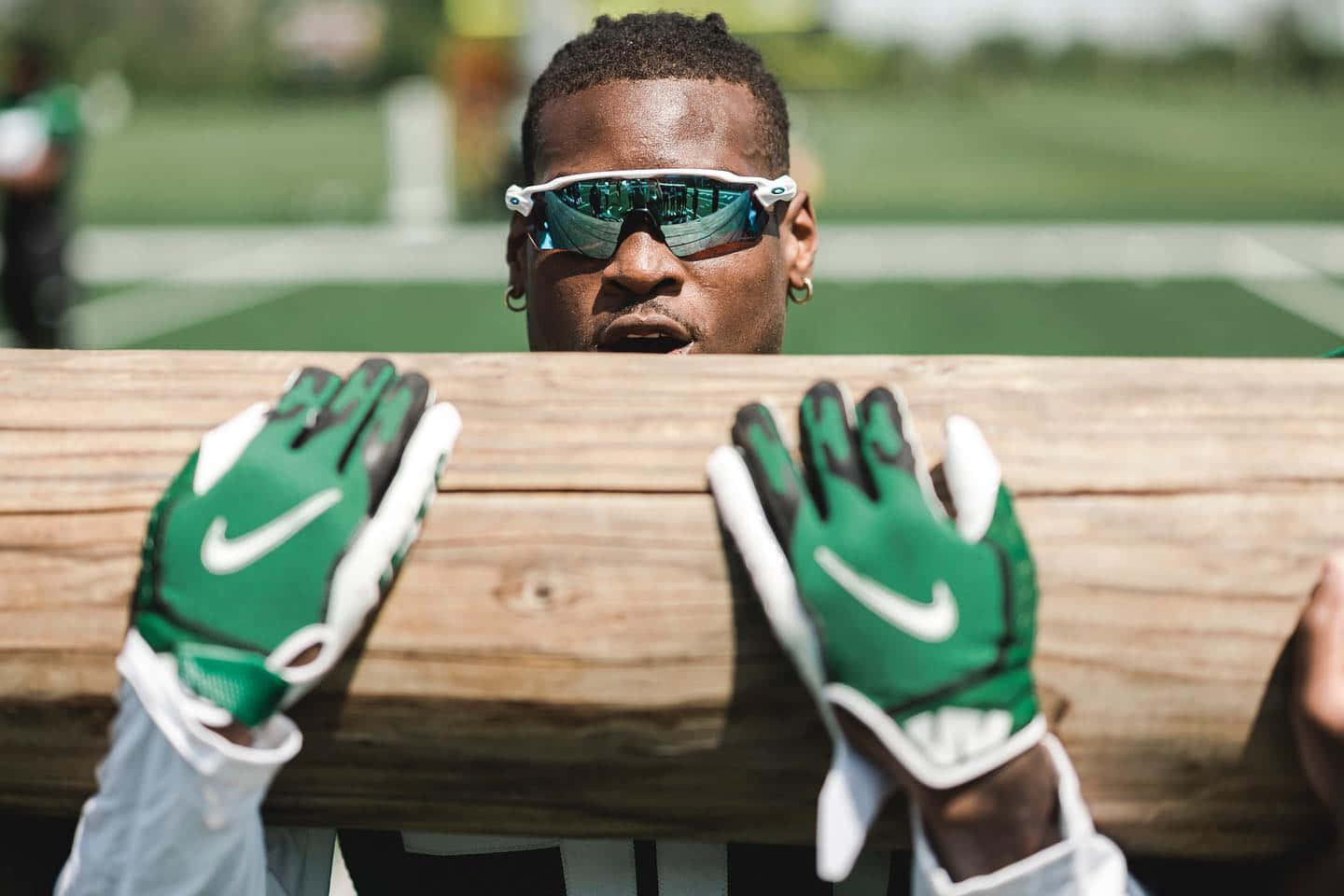 Football Player Mirrored Sunglasses Wallpaper