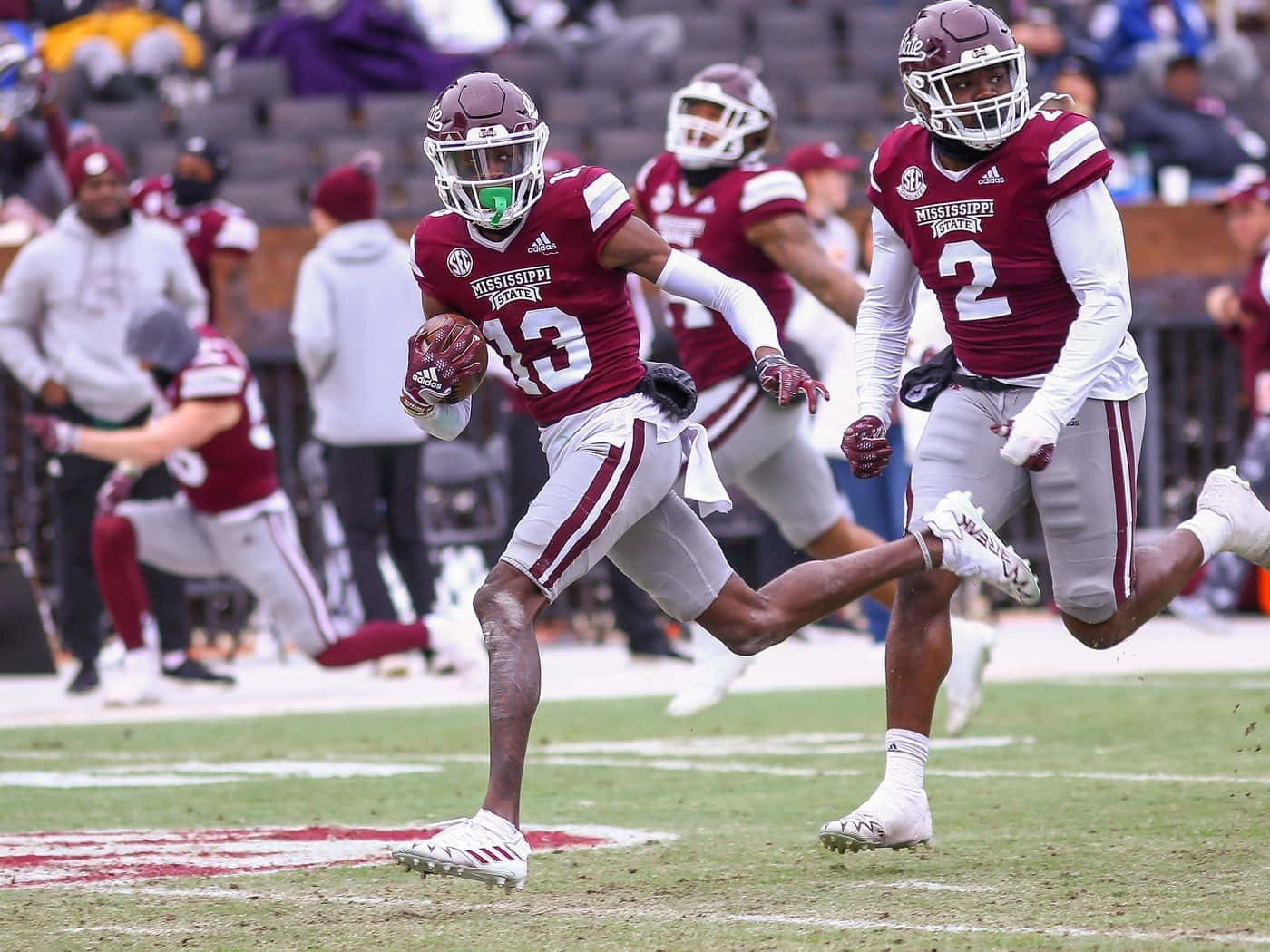 Football Player Running With Ball Wallpaper