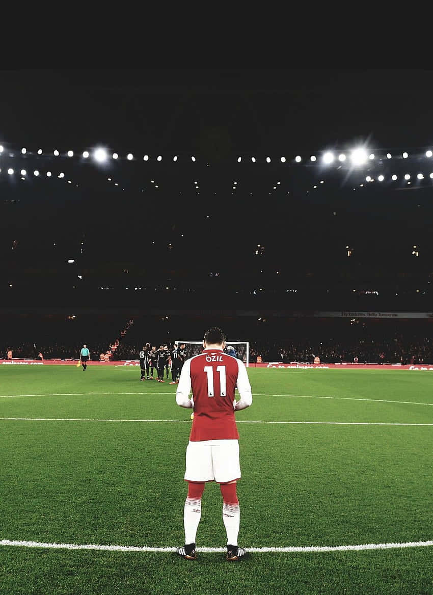 Footballer Ozil Standing Field Night Game Wallpaper