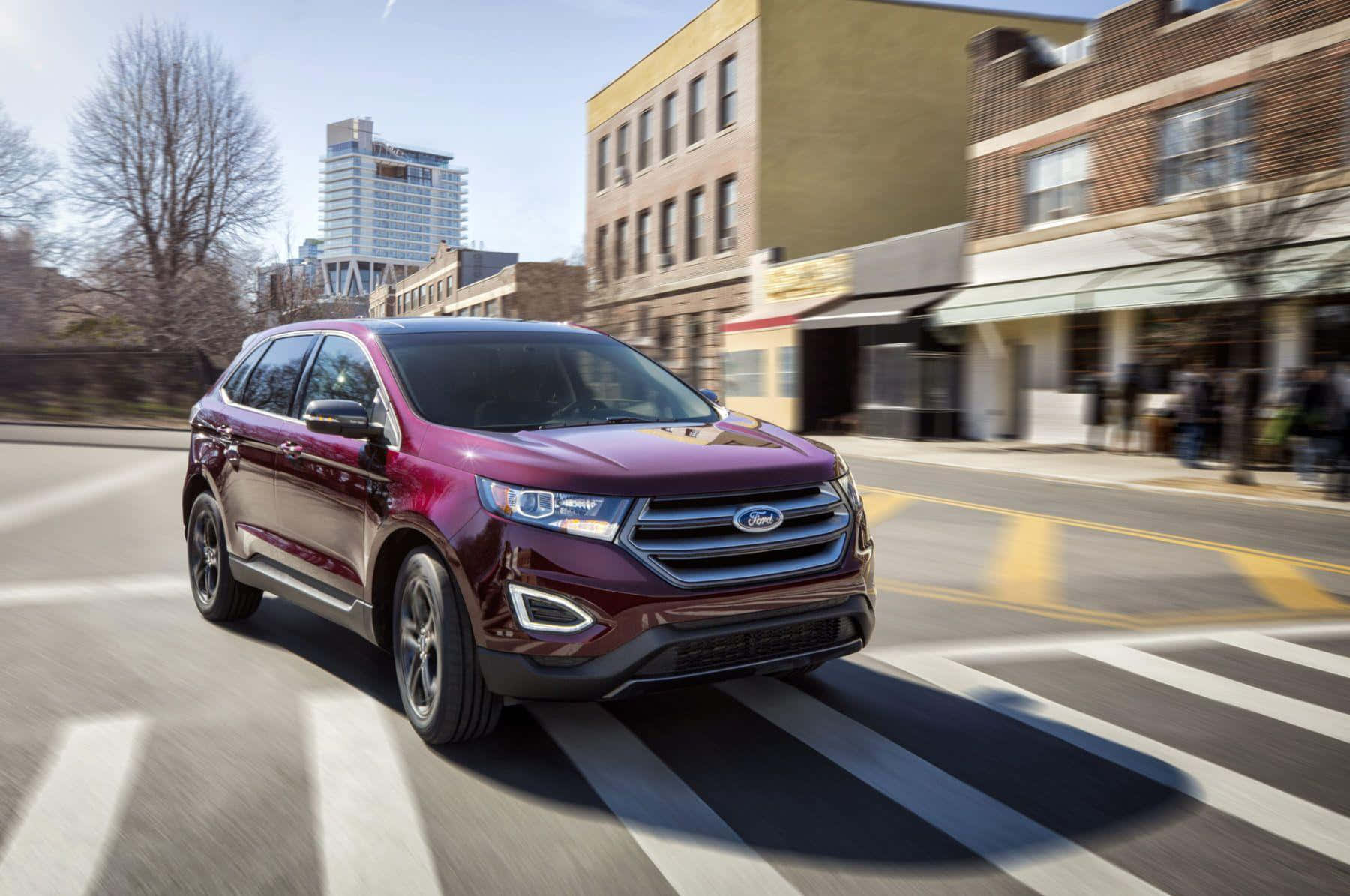 Ford Edge Driving On A Beautiful Road Wallpaper