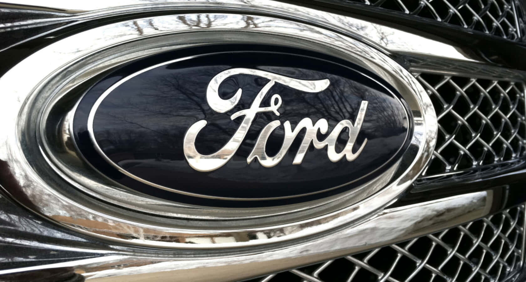 Ford Emblem On A Shimmering Background Wallpaper