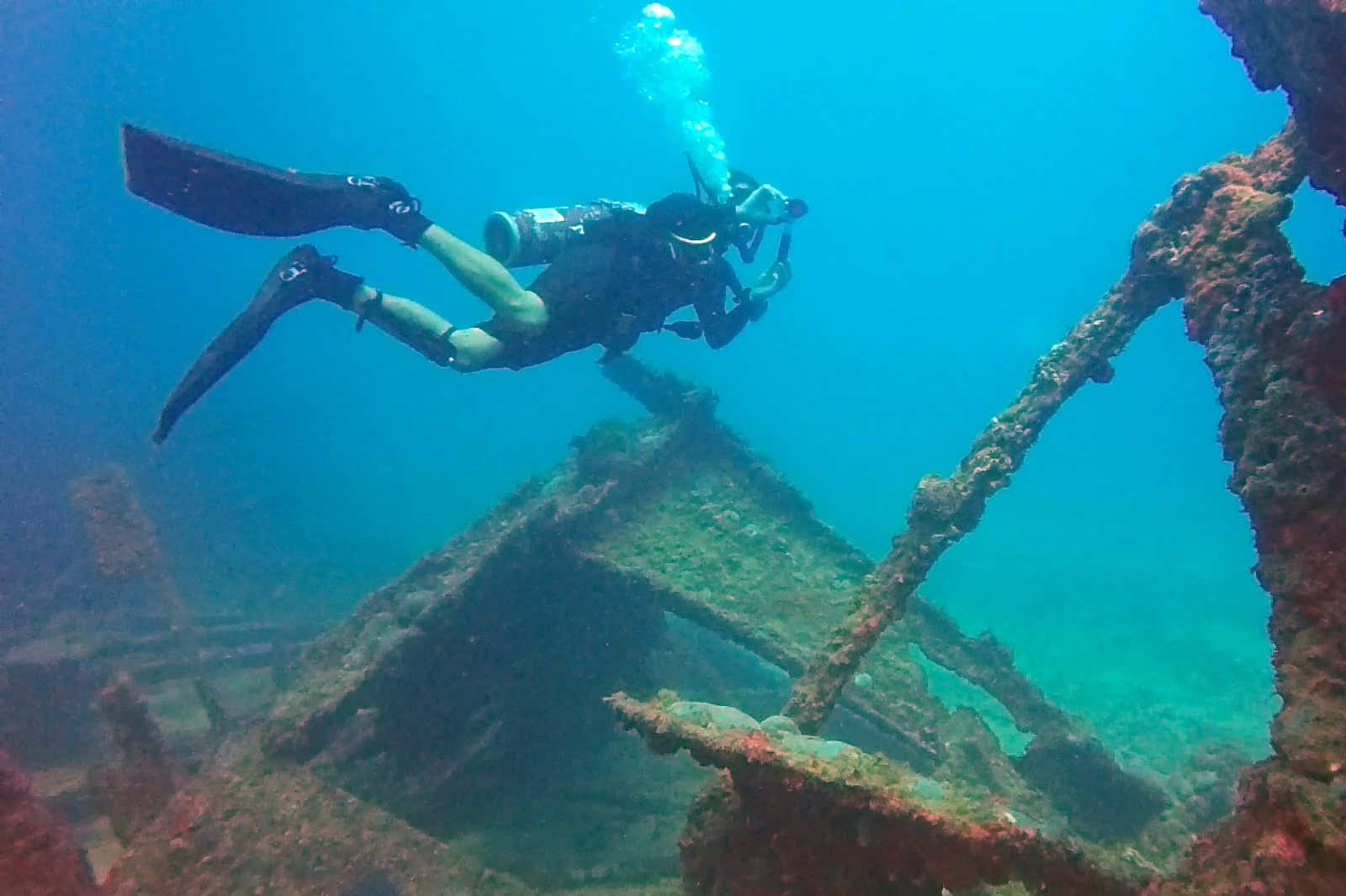 Forgotten Vessel: A Mysterious And Abandoned Shipwreck Wallpaper