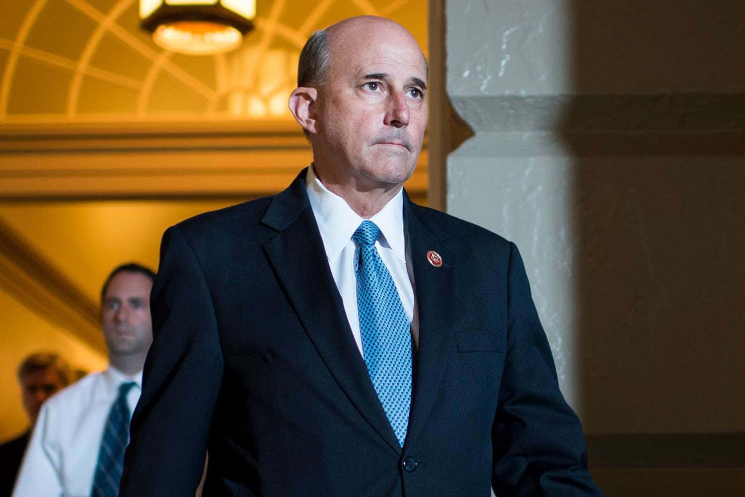 Former Representative Louie Gohmert Against A Bold Background Wallpaper