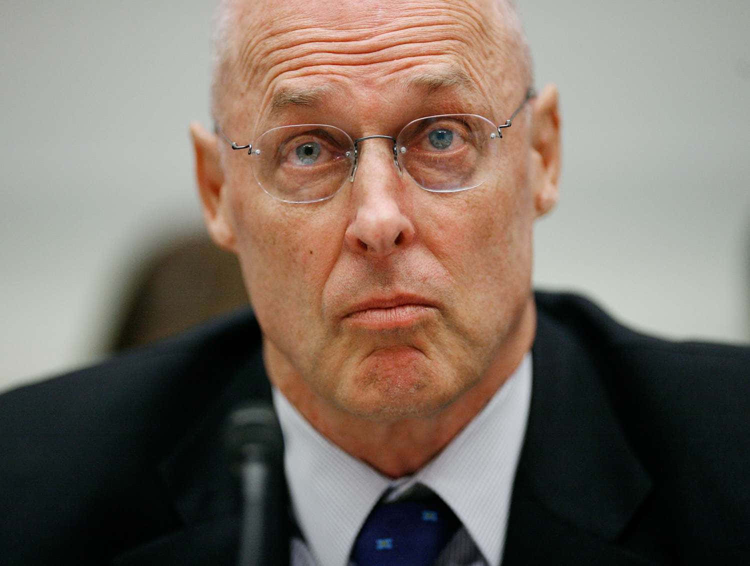 Former U.s. Secretary Of Treasury Henry Paulson Testifying At A Hearing Wallpaper