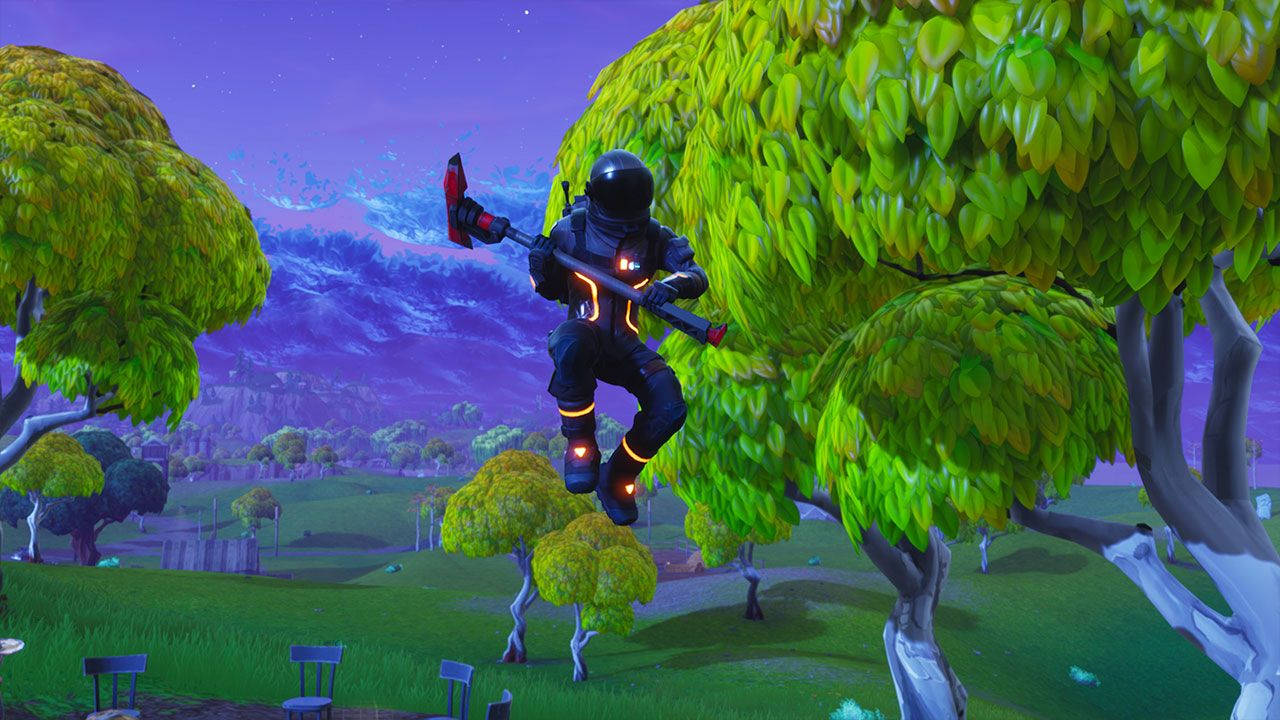 Fortnite - A Man Flying Over Trees Wallpaper