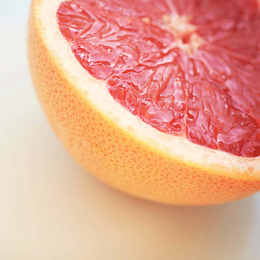 Fresh And Juicy Pink Grapefruit Wallpaper