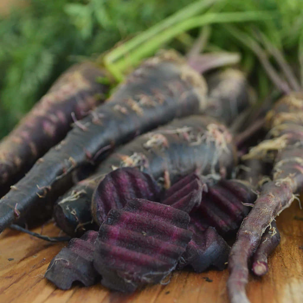 Fresh, Nutritious And Delicious Purple Carrots Wallpaper