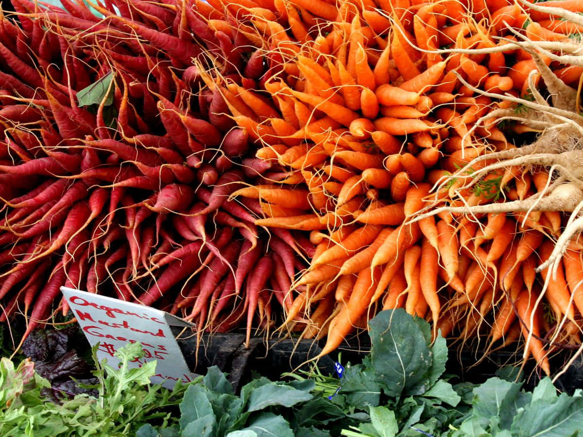 Fresh Produce At A Bustling Farmers Market Wallpaper