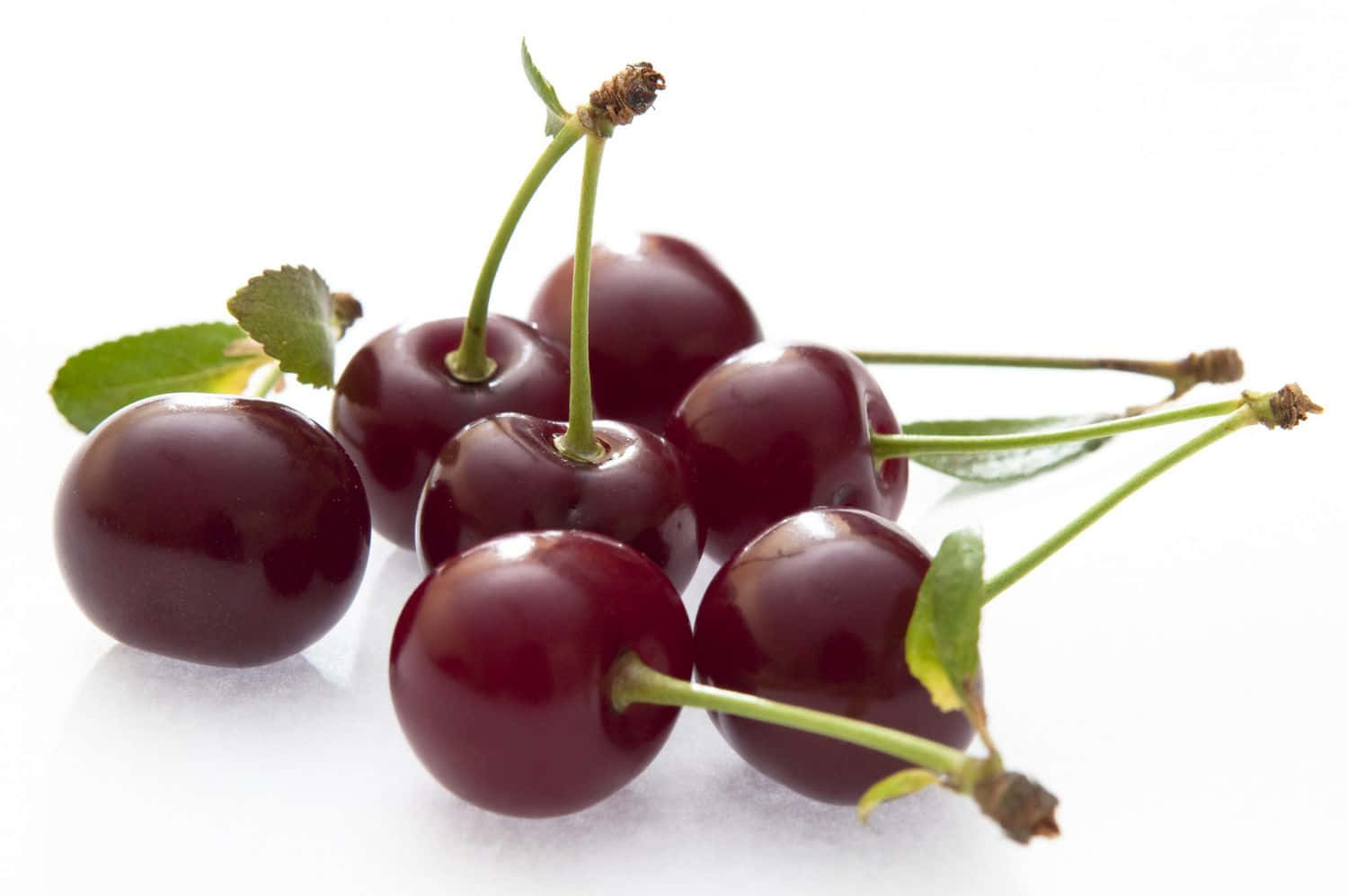 Fresh Red Cherries On Display Wallpaper