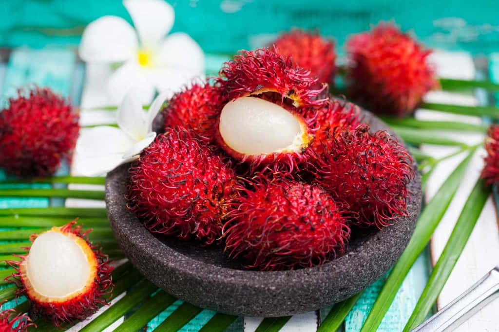 Fresh Red Fruit On A Rustic Table Wallpaper