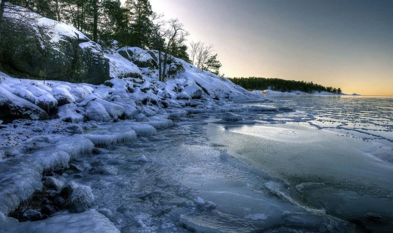 Frozen Lake In Winter Wonderland Wallpaper