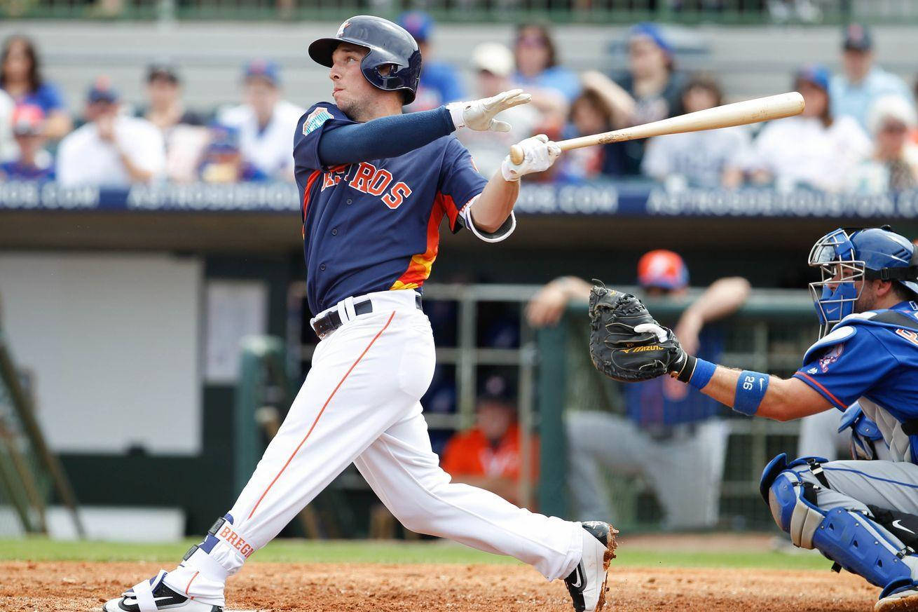 Full Body Of Alex Bregman Swinging While Running Wallpaper