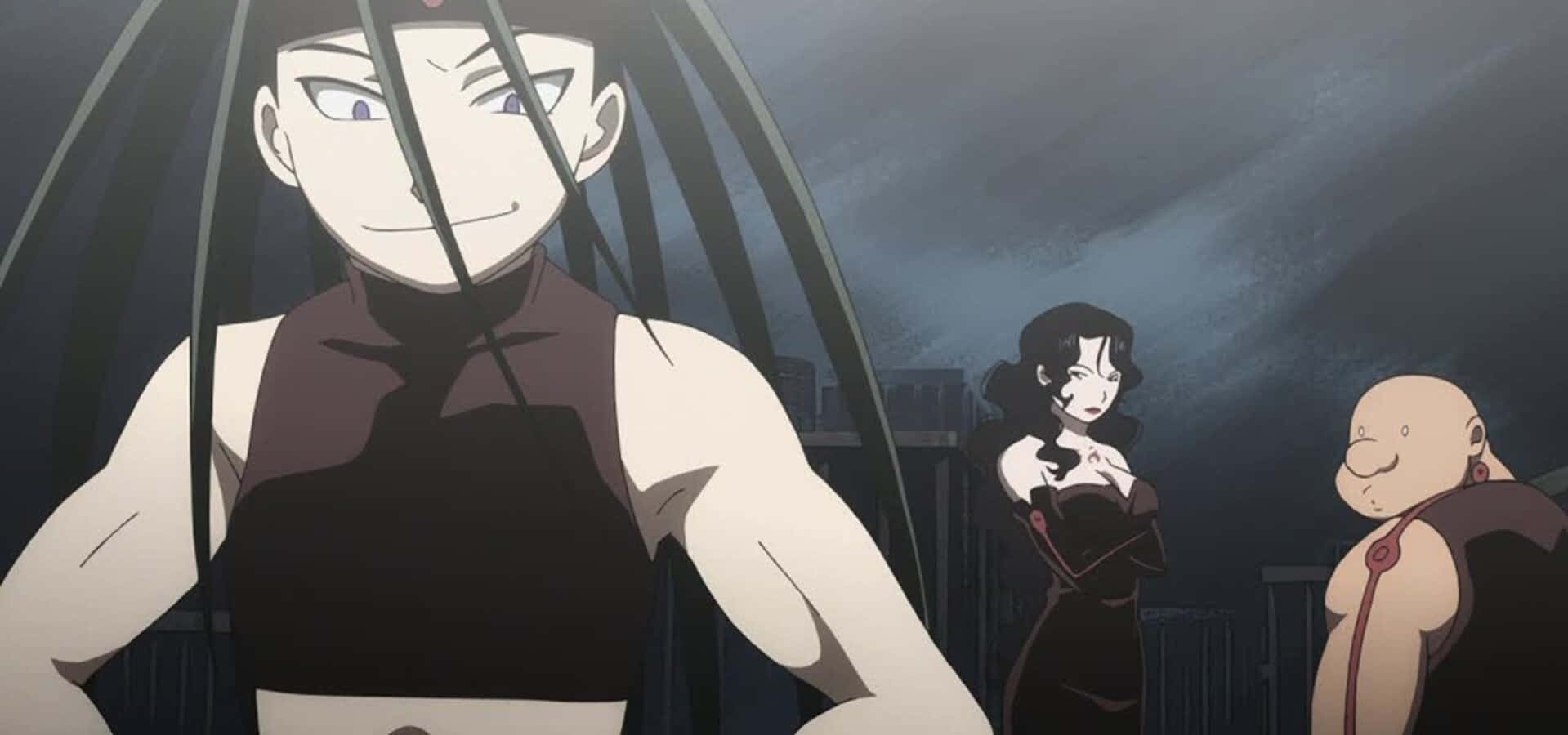 Fullmetal Alchemist Gluttony Menacingly Grins Against A Dark Background Wallpaper