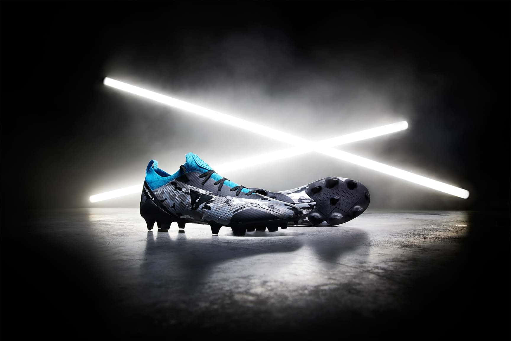 Futuristic Soccer Cleats Spotlight Wallpaper