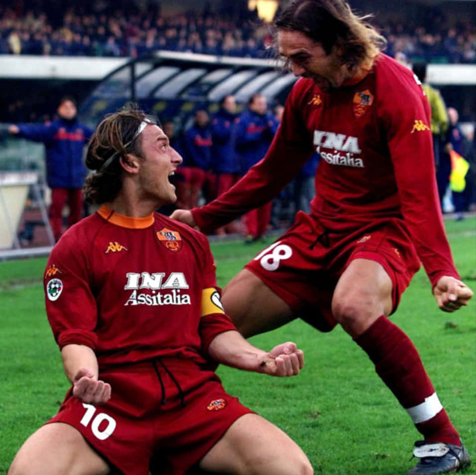 Gabriel Batistuta And Francesco Totti Celebrating Wallpaper