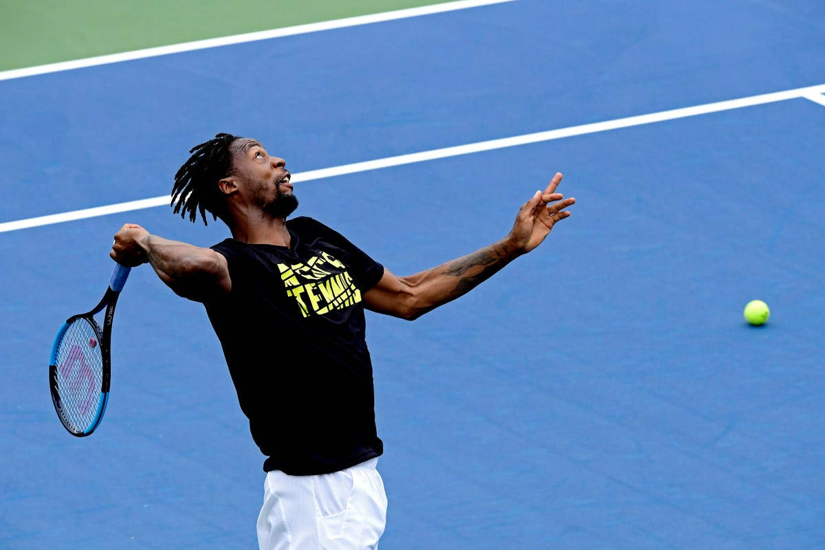 Gael Monfils Swinging Tennis Racket Wallpaper