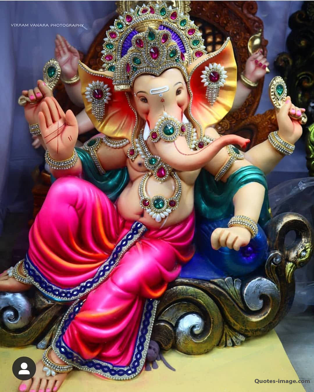 Ganpati Hd Sitting On A Blue Throne Wallpaper