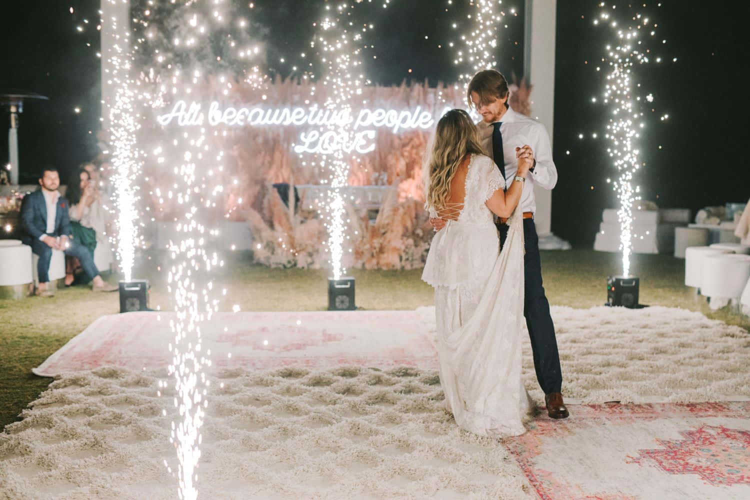 Garden Wedding Ceremony Under Elegant Floral Arch Wallpaper