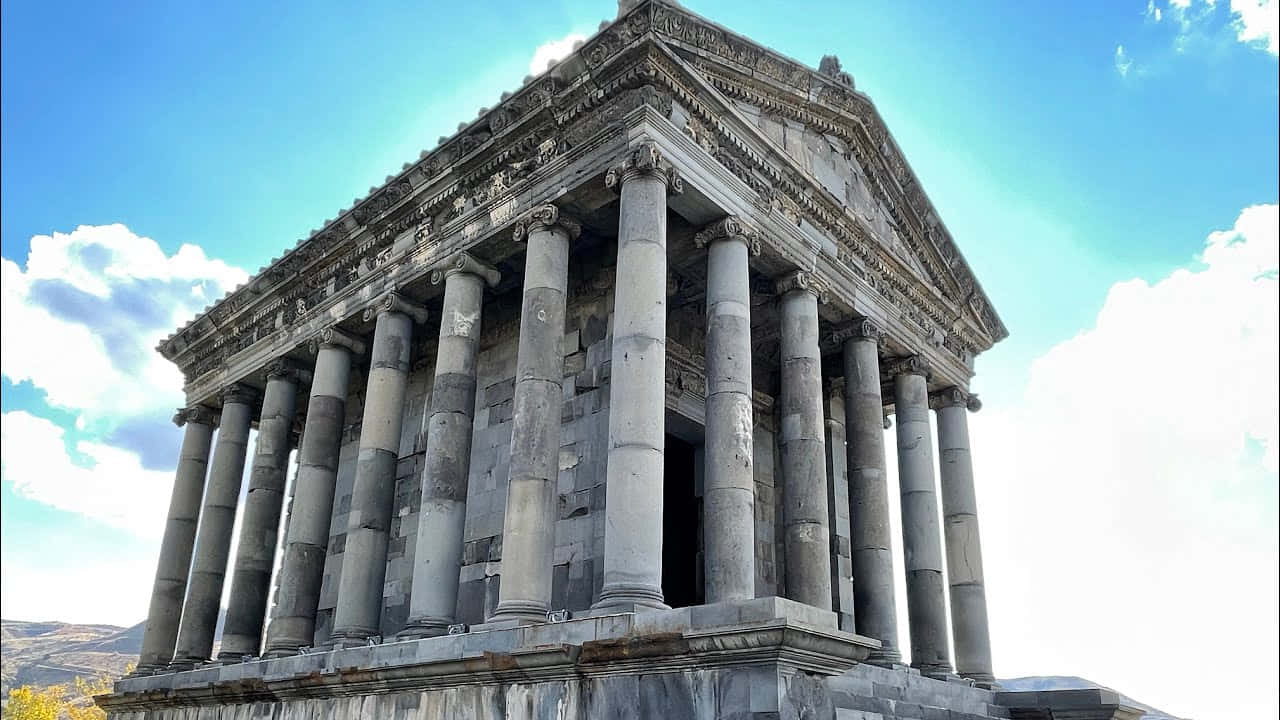 Garni Temple Under Bright Blue Sky Wallpaper