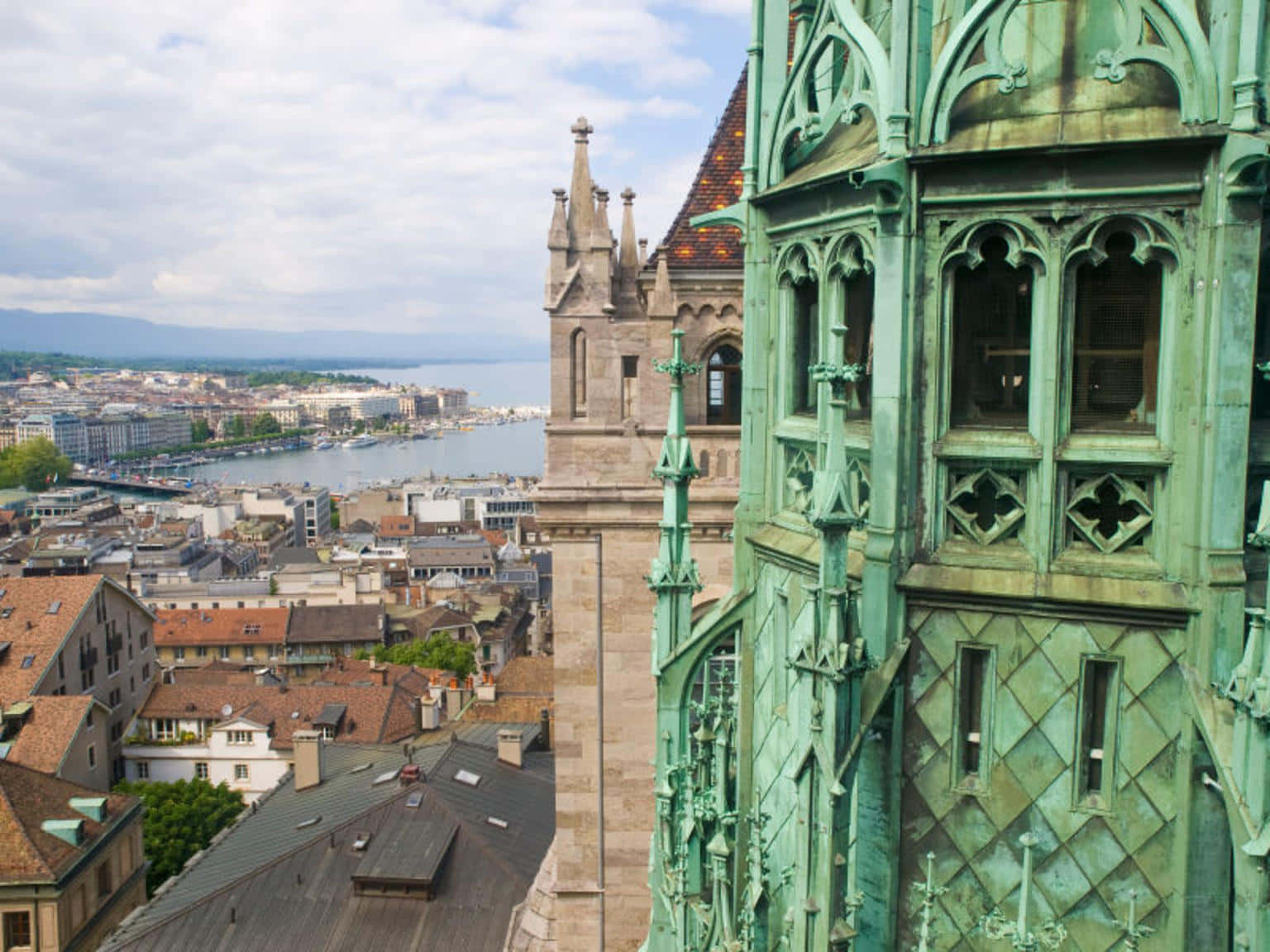 Geneva Rooftop Viewwith Spire Wallpaper