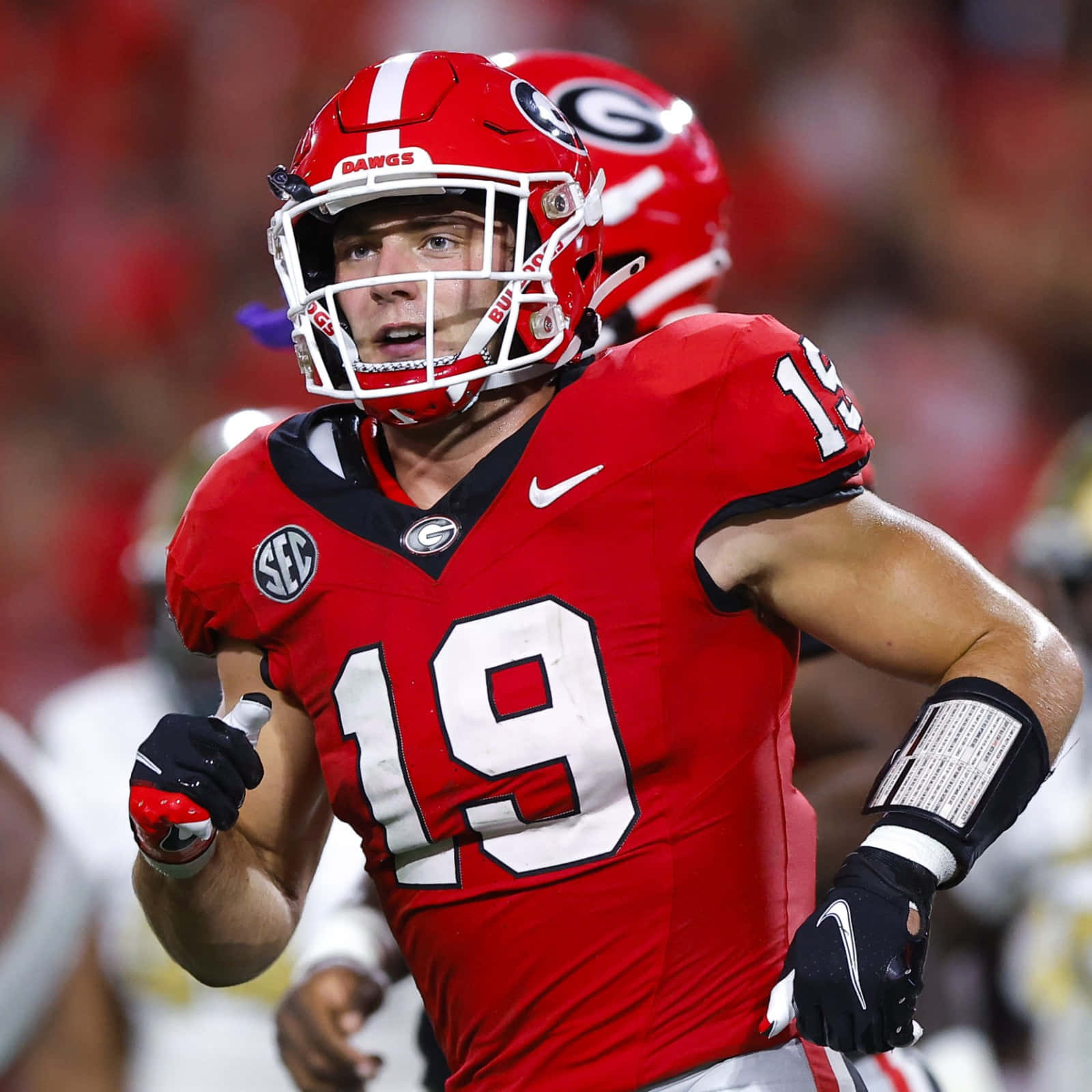 Georgia Football Player Brock Bowers Action Shot Wallpaper