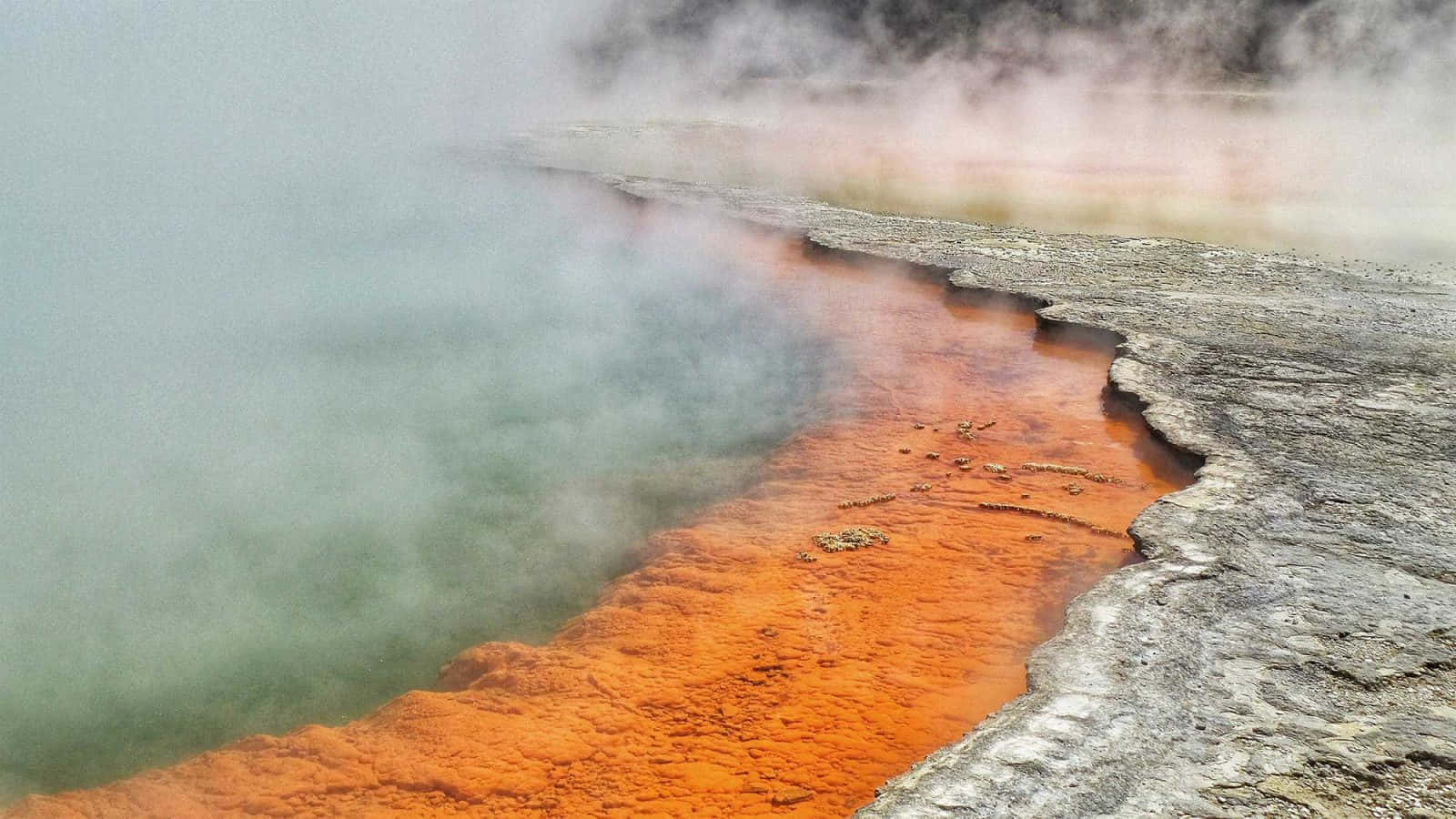 Geothermal_ Hot_ Spring_ Orange_ Deposits Wallpaper