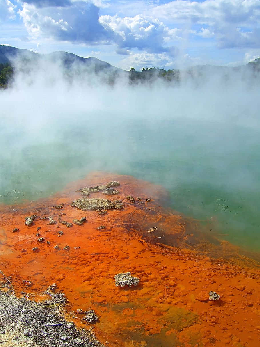 Geothermal_ Hot_ Spring_ Steam_and_ Colorful_ Deposits.jpg Wallpaper