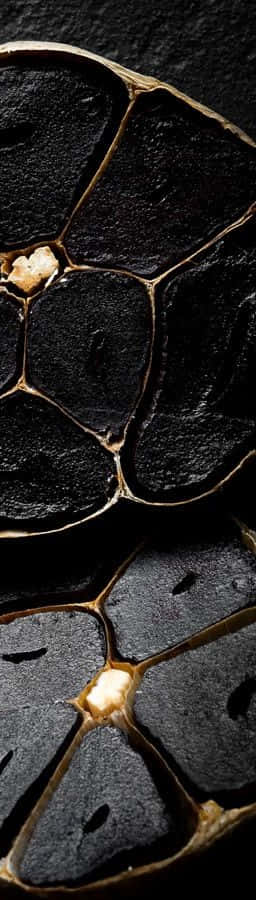 Get A Taste Of Umami With Black Garlic Wallpaper