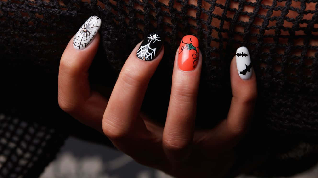 Get Creative With Eerie Halloween Nail Art Wallpaper