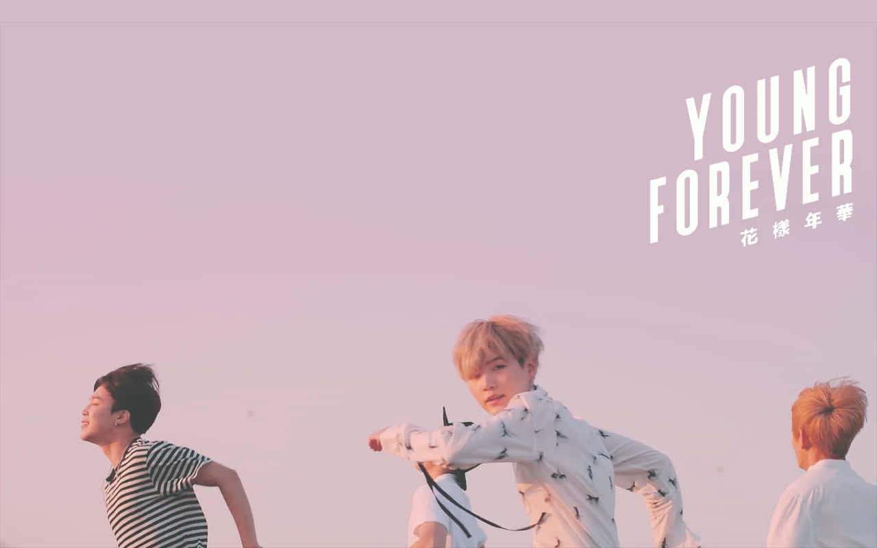 Get Lost In The Dreamy Pink Aesthetic Of Bts With This Desktop Wallpaper Wallpaper