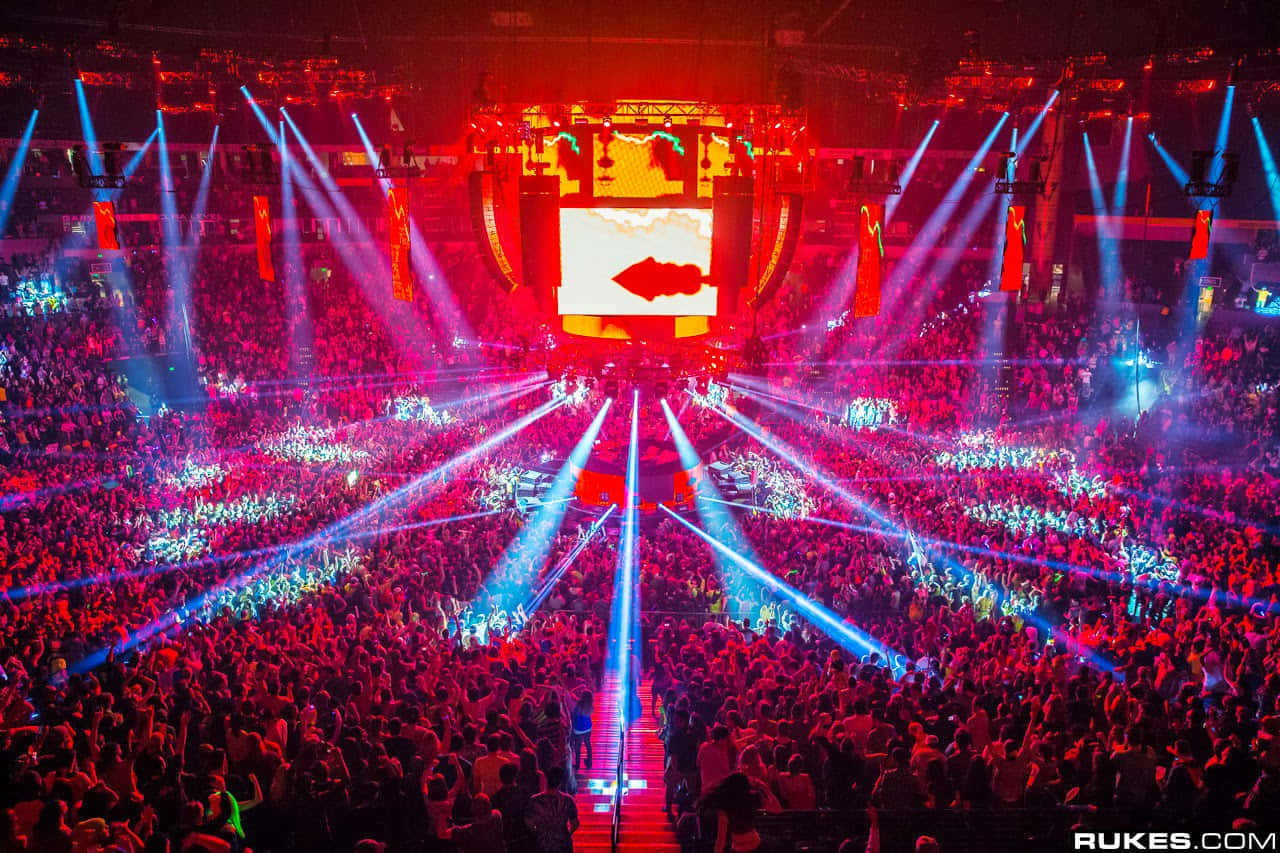 Get Lost In The Pulsing Music Of The Edm Scene Wallpaper