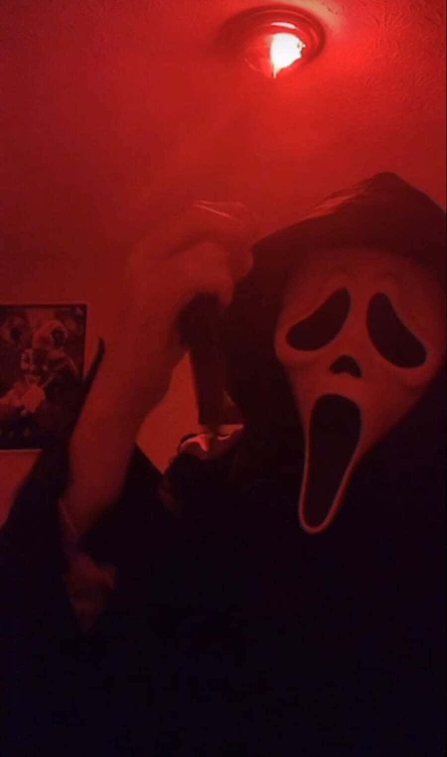 Ghostface Mask Illuminated In Neon Lights Wallpaper