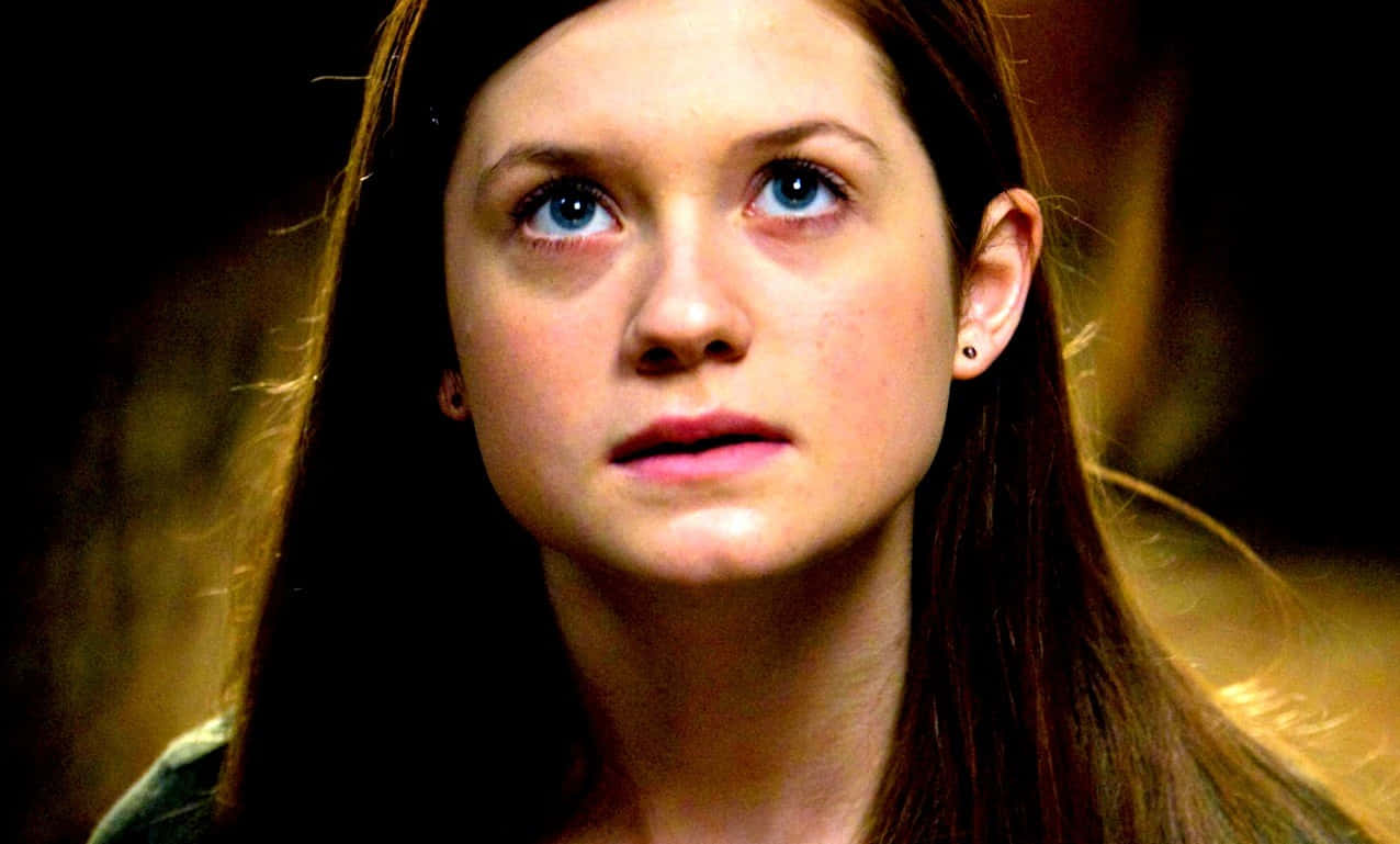 Ginny Weasley Displaying Her Bravery And Determination Wallpaper