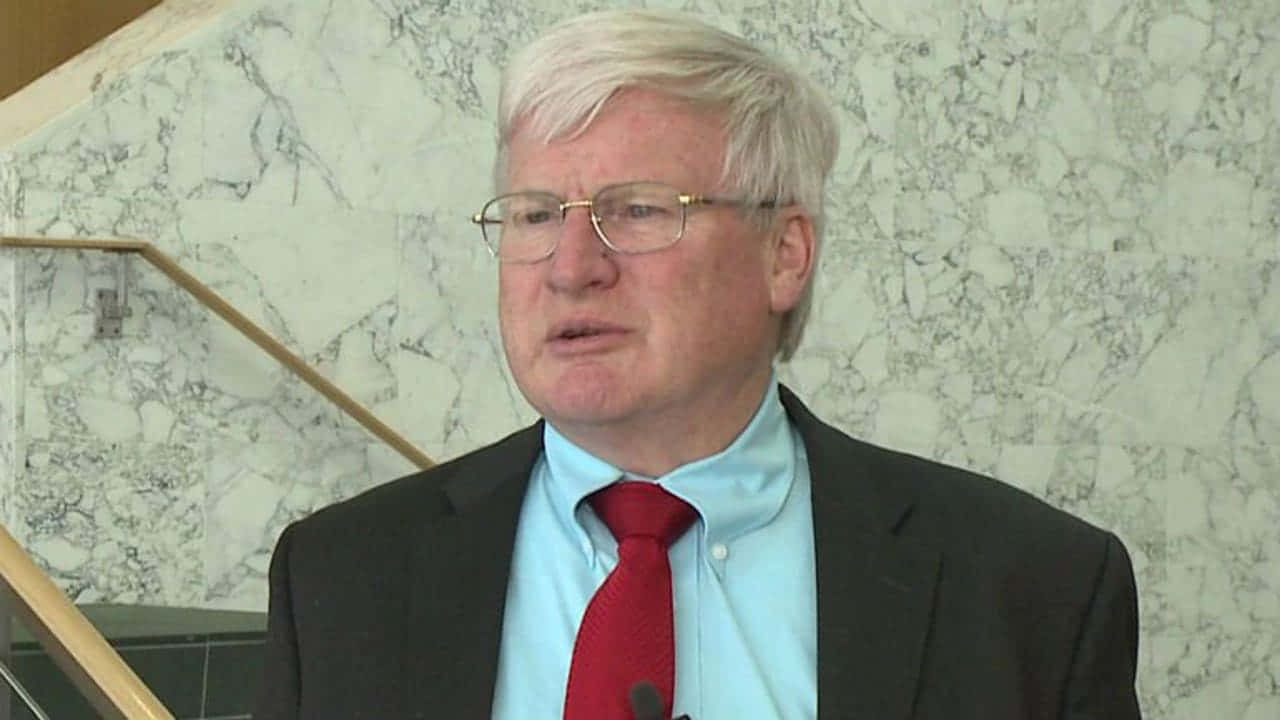 Glenn Grothman Speakingat Event Wallpaper