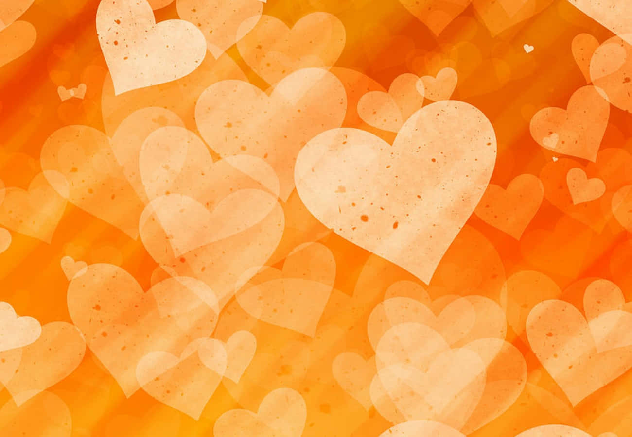 Glowing Orange Heart On A Dark Background Wallpaper