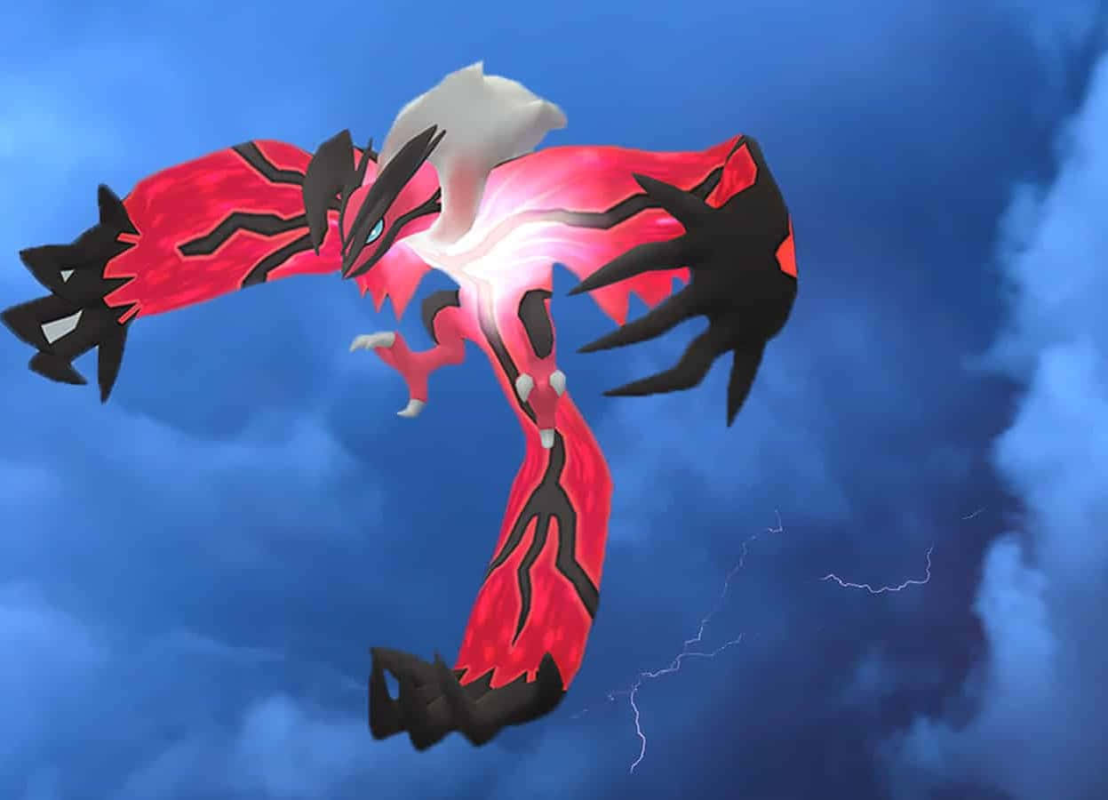 Glowing Yveltal Pokemon In The Sky Wallpaper