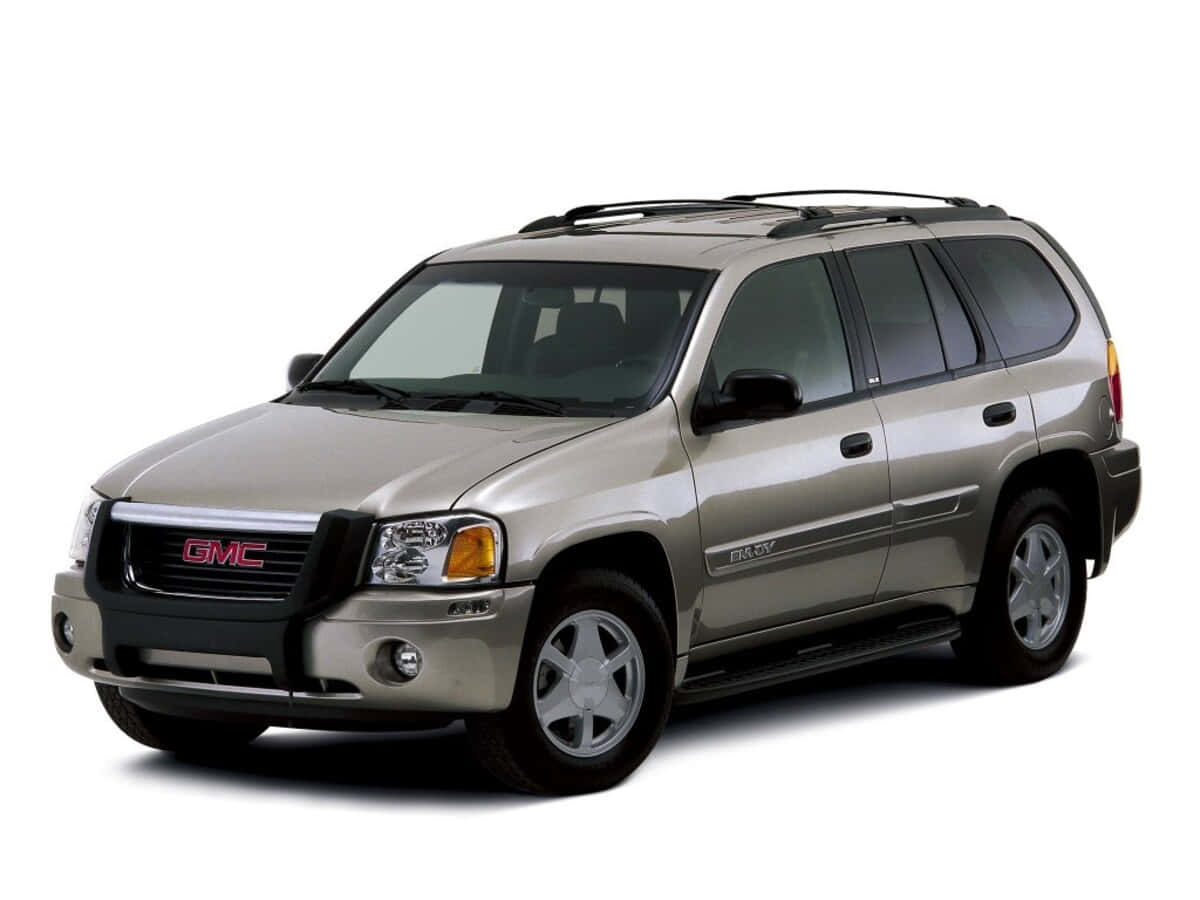 Gmc Envoy Suv On The Road Wallpaper